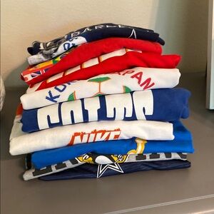 9 sports T shirt bundle Nike NFL NCAA NHL Soccer Various Sizes Chiefs Cowboys